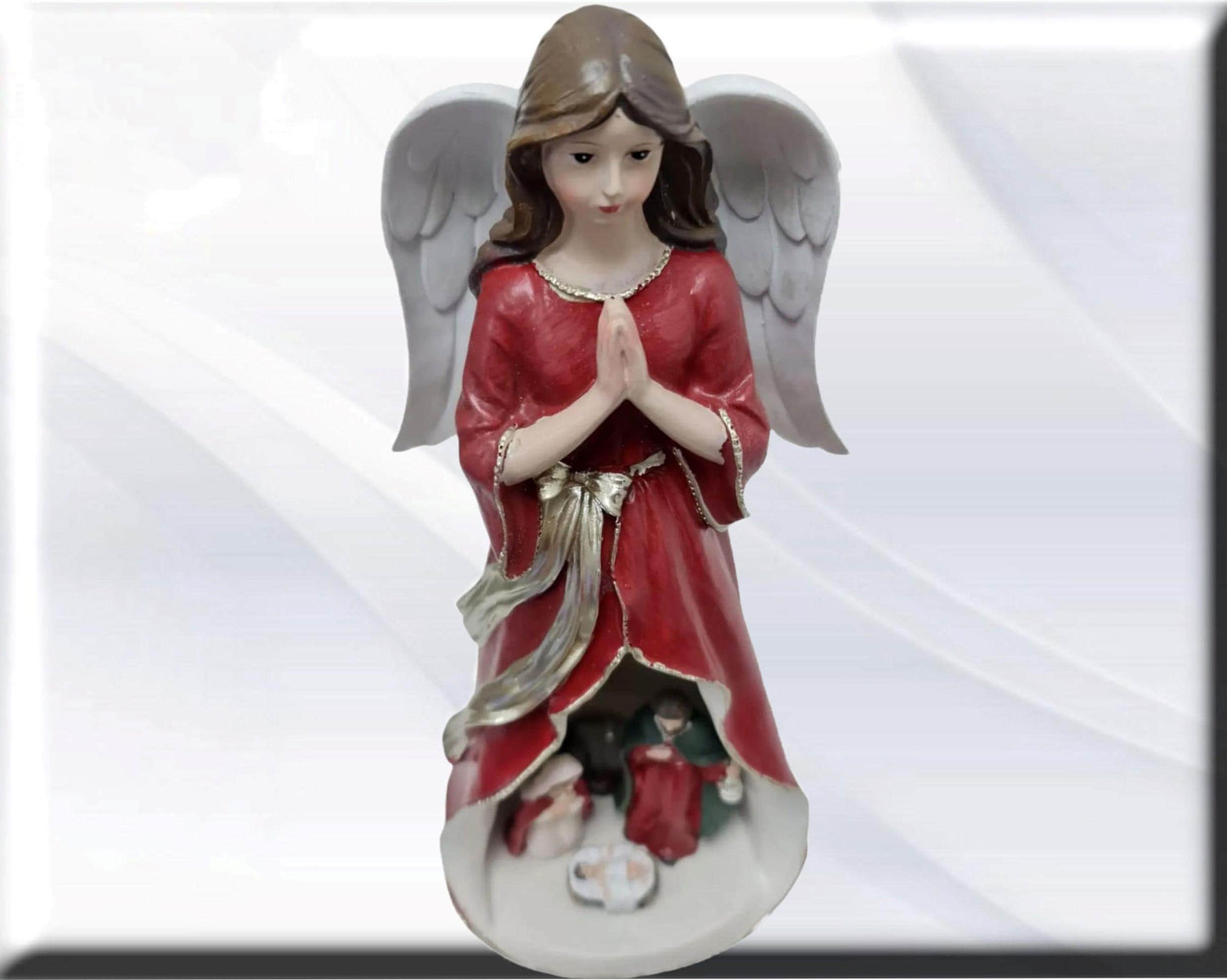 Angel statue with Holy Family , Catholic virgins and saints