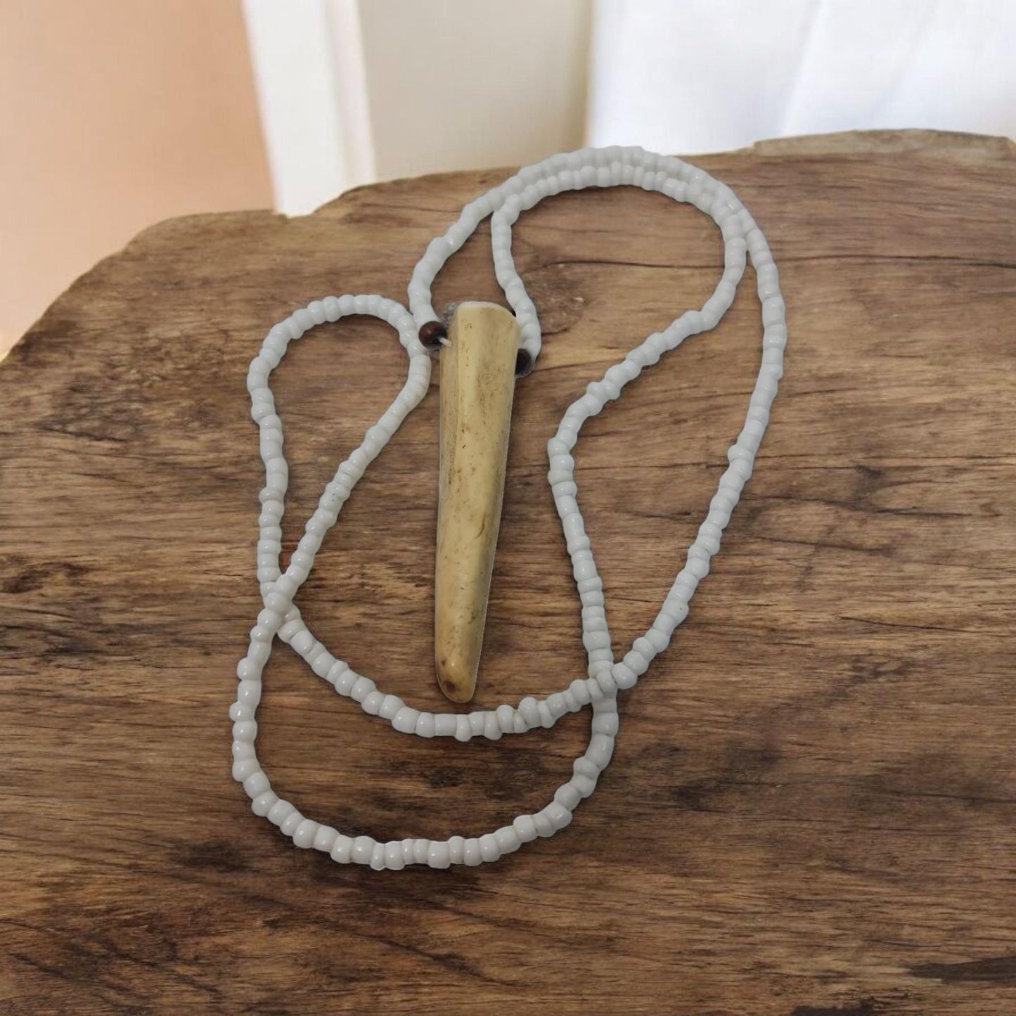 colgante cuerno de protección ritualizado