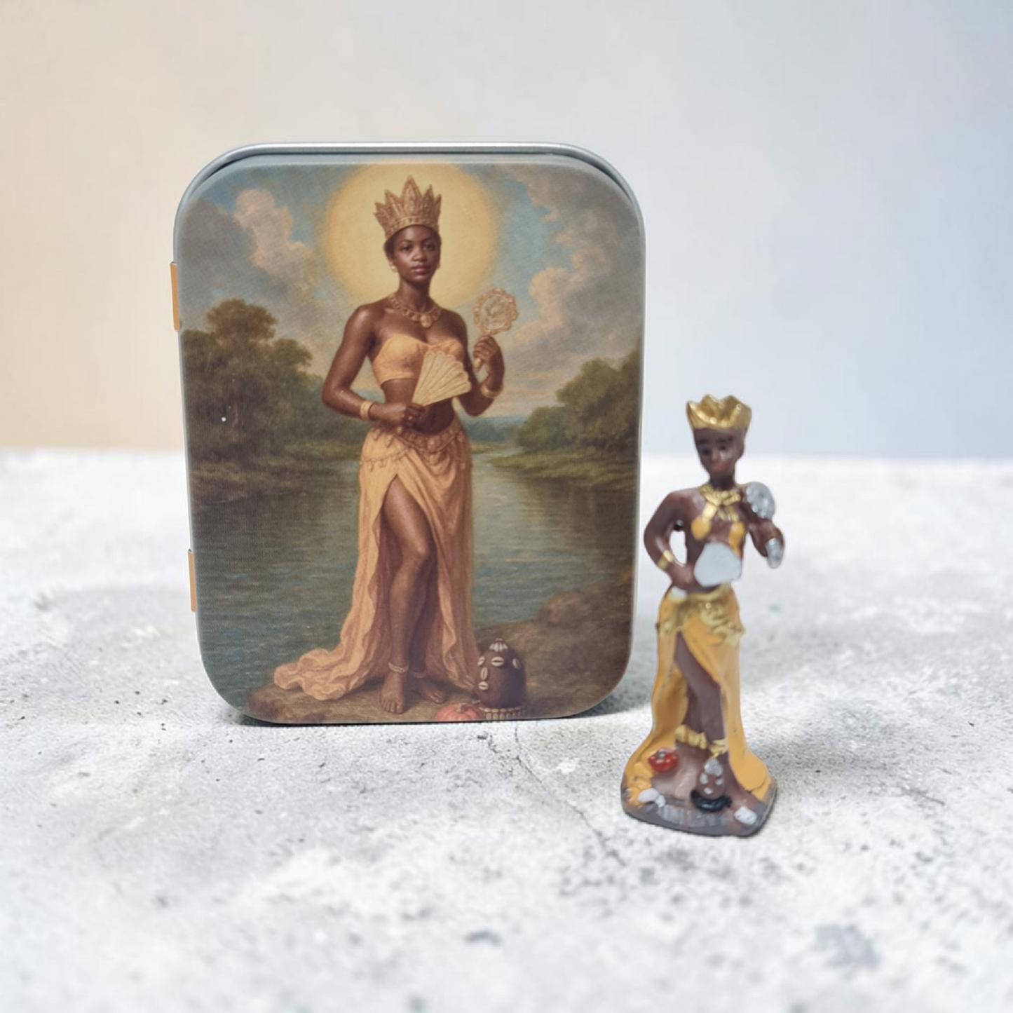 Orishas de 5cm , en lata con diseño