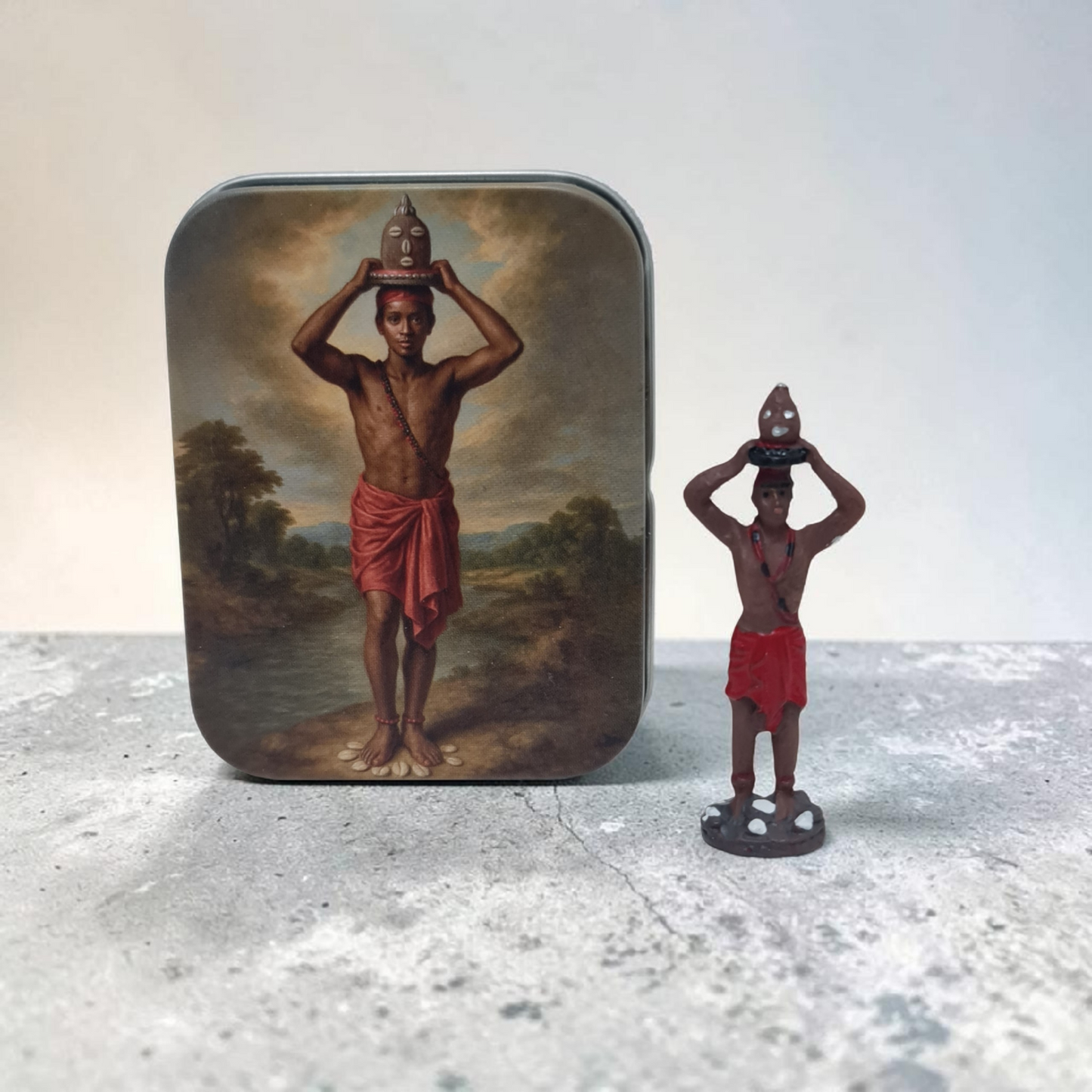 Orishas de 5cm , en lata con diseño