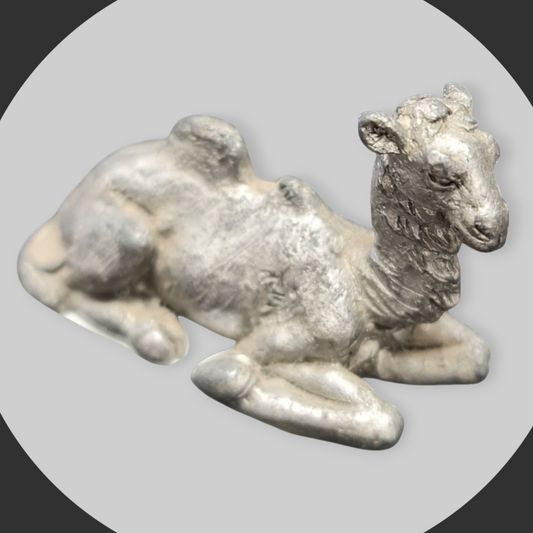 Camello de metal