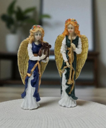 Pareja de Ángeles músicos