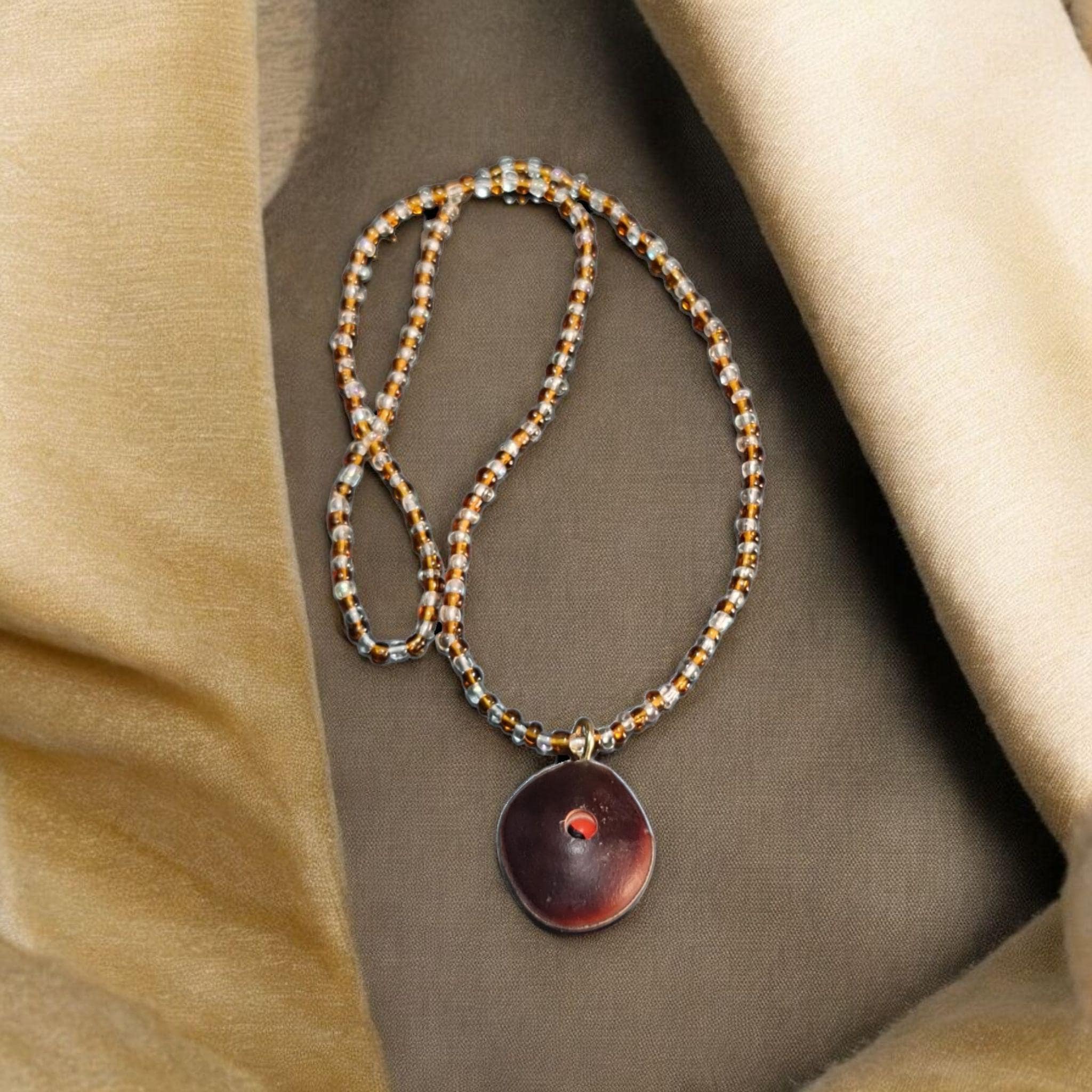 collar Ojo de buey suerte proteccion