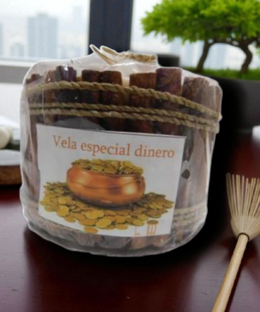 vela canela dinero